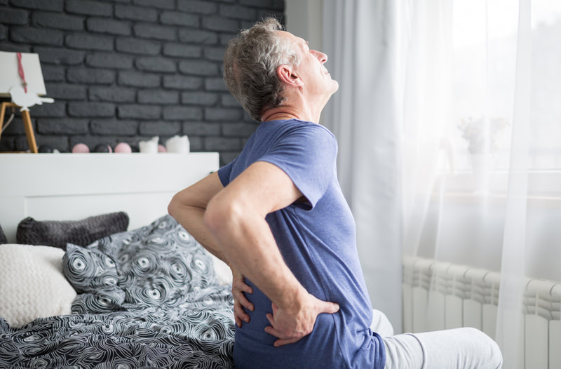 Man suffering with lower back pain  